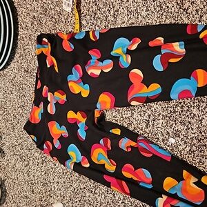LulaRoe leggings. One size fits most. Black with Micky Mouse heads on them